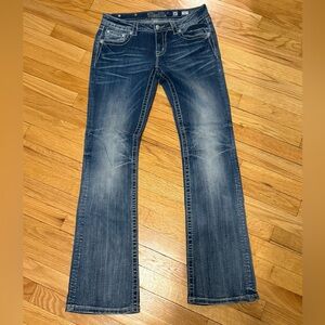 Miss Me jeans with a signature boot cut